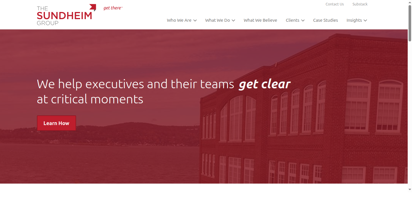 The Sundheim Group Astro homepage with red hero section and rotating get clear message